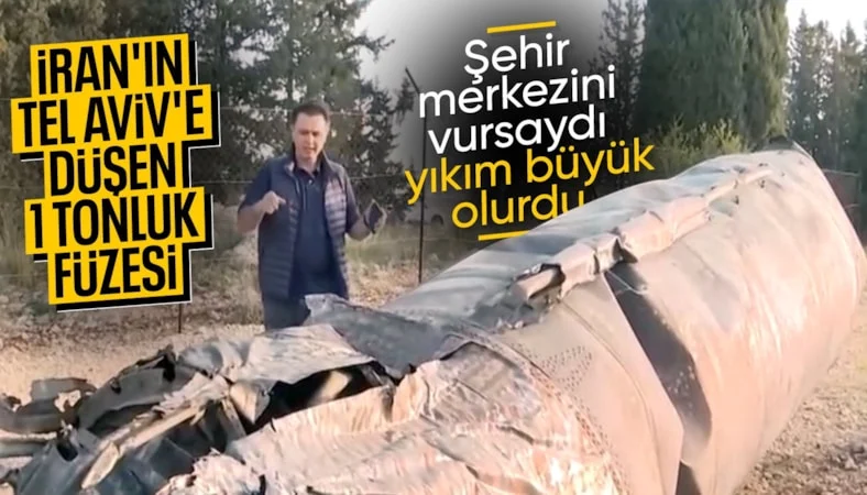 İran'dan Tel Aviv'e atılan devasa f&uuml;zenin enkazı g&ouml;r&uuml;nt&uuml;lendi